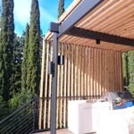 custom pergola with wood slats and outdoor kitchen construction Los Altos Hills