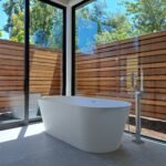 Modern freestanding bathtub installation in Bay Area home