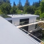 modern flat roof home with custom skylight and clean architectural design Menlo Park