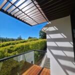 modern pergola with wood deck and glass railing balcony Palo Alto